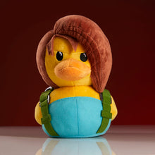 Load image into Gallery viewer, Front View of Jill Valentine Resident Evil TUBBz Plush duck toy with colorful design on a red background