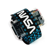 Load image into Gallery viewer, A clear plastic smartwatch case with a black elastic strap featuring large white NASA lettering and blue circuit-like dot patterns, shown on a white background.