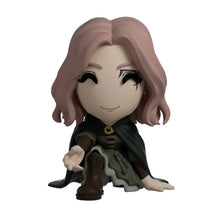 Load image into Gallery viewer, Melina figurine wearing a dark cloak and boots on a white background
