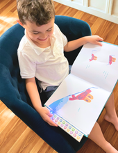 Load image into Gallery viewer, Child using recordable reading budddy
