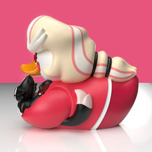 Load image into Gallery viewer, Close up view of Charlie Morningstar rubber duck figurine holding a black key with a helmet and backpack on a pink background
