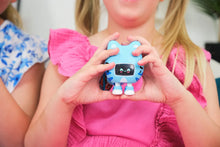 Load image into Gallery viewer, Child holding a blue robot toy with a smiling face
