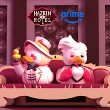 Load image into Gallery viewer, Hazbin Hotel Lucifer and Angel Dust ducks sitting on a couch with 'Hazbin Hotel' and 'Amazon Prime' logos in the background
