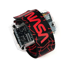 Load image into Gallery viewer, Black and red strap with 'NASA' branding on a white background. 
