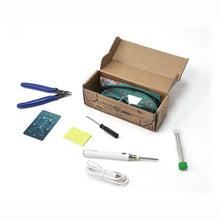 Load image into Gallery viewer, Soldering kit with tools and components on a white background
