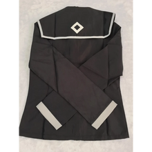 Load image into Gallery viewer, Black uniform with white trim on a textured beige background
